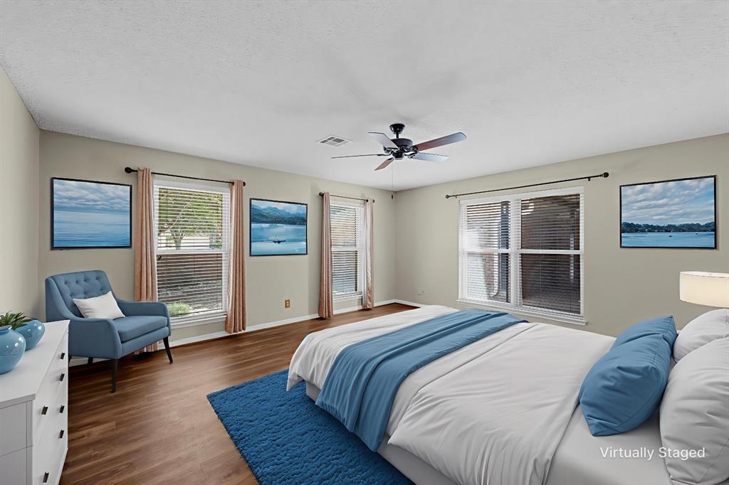 4108 Old Mill Road Waco, TX 76710 - Photo 17 of 40 a bedroom with a large bed and a window