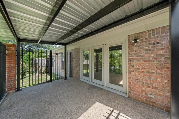 a view of a porch with furniture