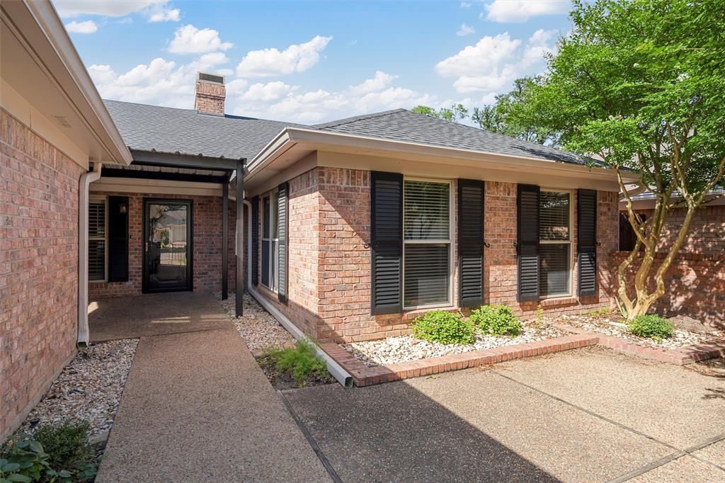 4108 Old Mill Road Waco, TX 76710 - Photo 3 of 40 a front view of a house with garden