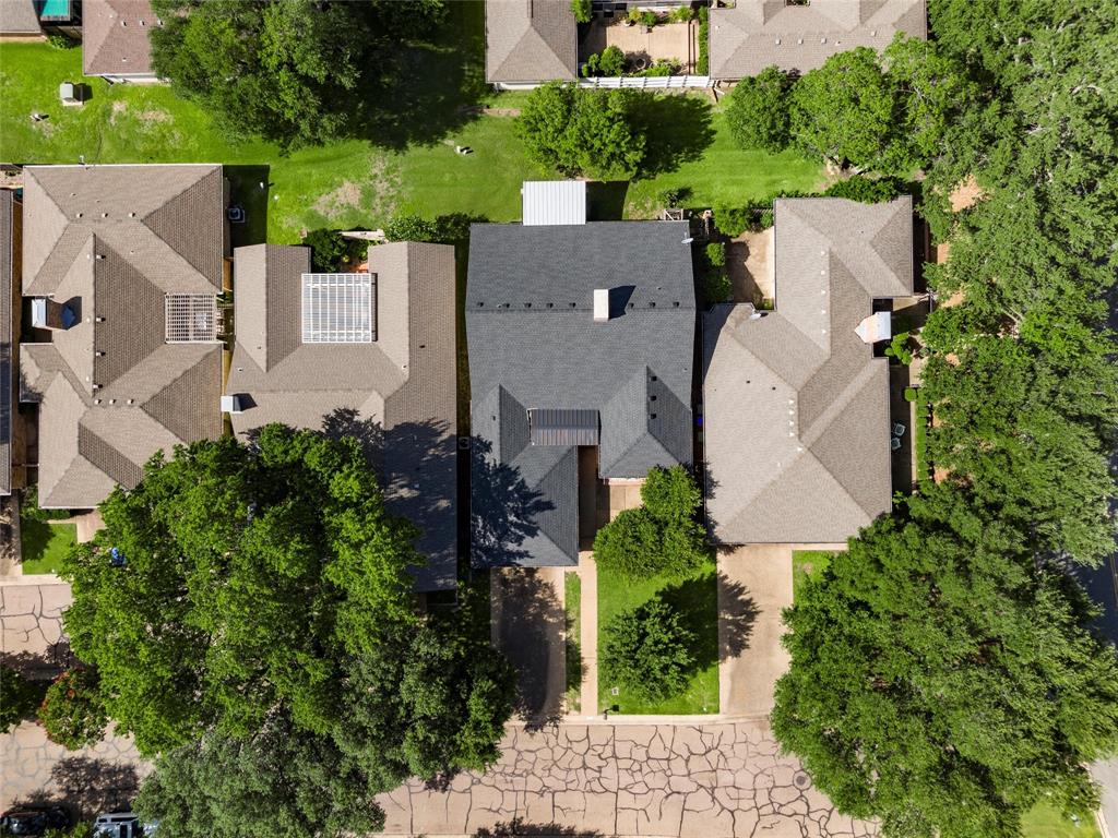 4108 Old Mill Road Waco, TX 76710 - Photo 35 of 40 an aerial view of a house with a yard and a fountain