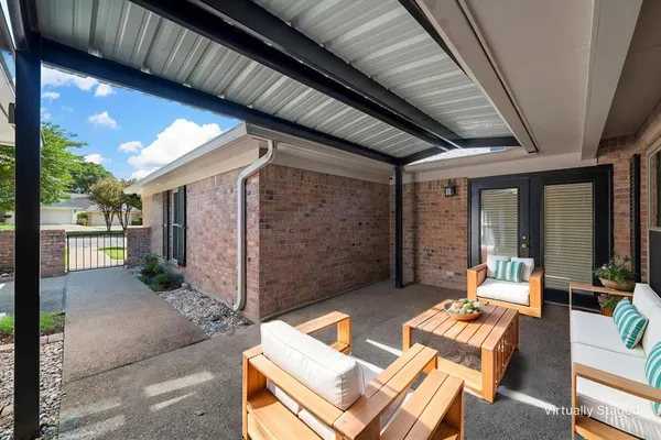 a outdoor space with patio lots of furniture