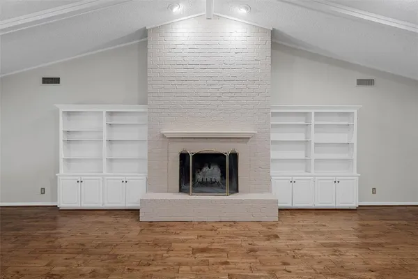 a view of a livingroom with a fireplace