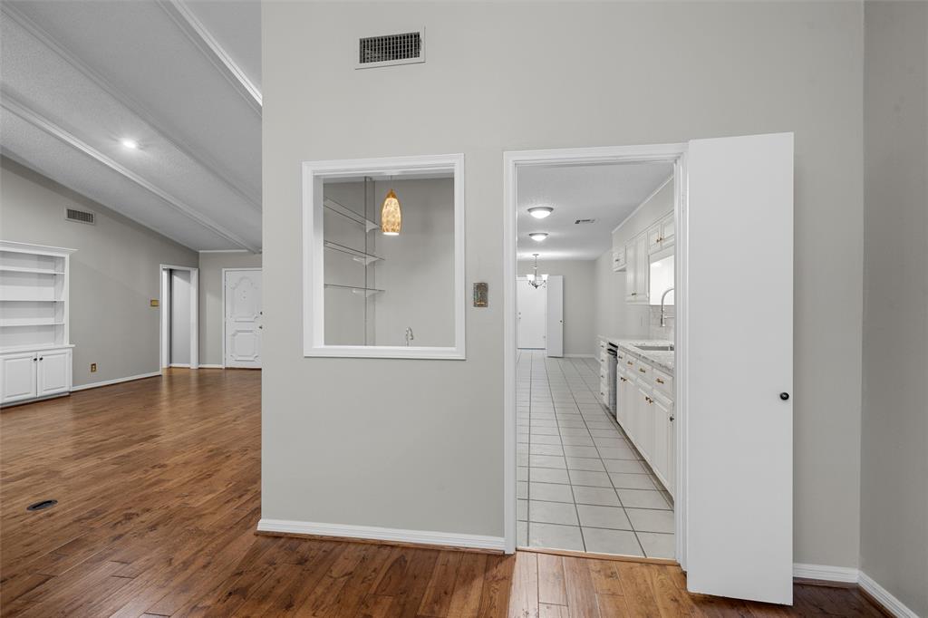 4108 Old Mill Road Waco, TX 76710 - Photo 10 of 40 a view of a hallway with wooden floor