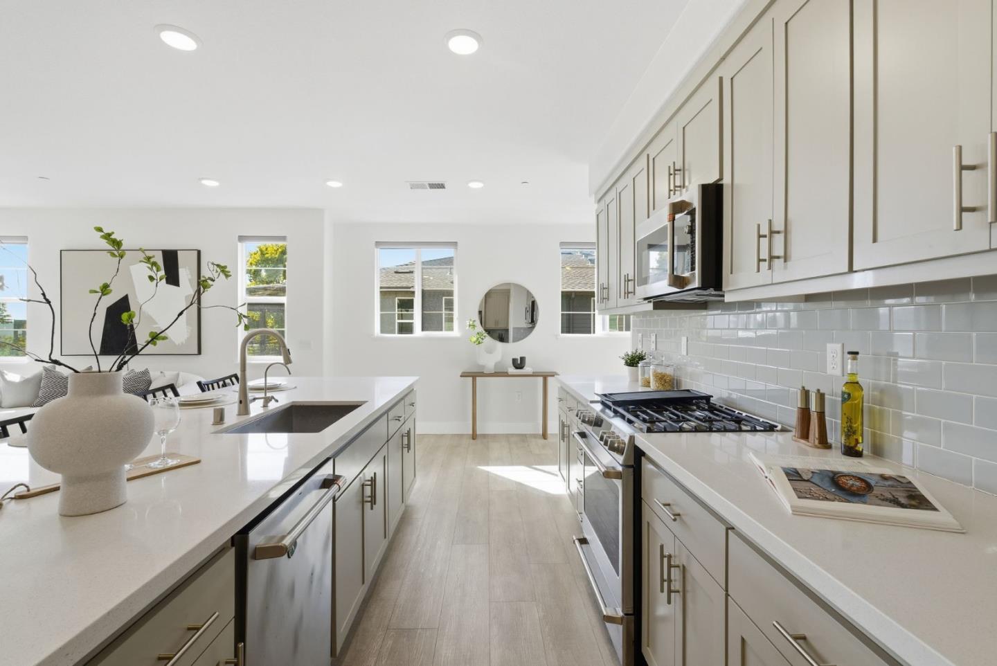 490 Trace Lane Hayward, CA 94544 - Photo 11 of 52 a kitchen with stainless steel appliances a sink stove and cabinets