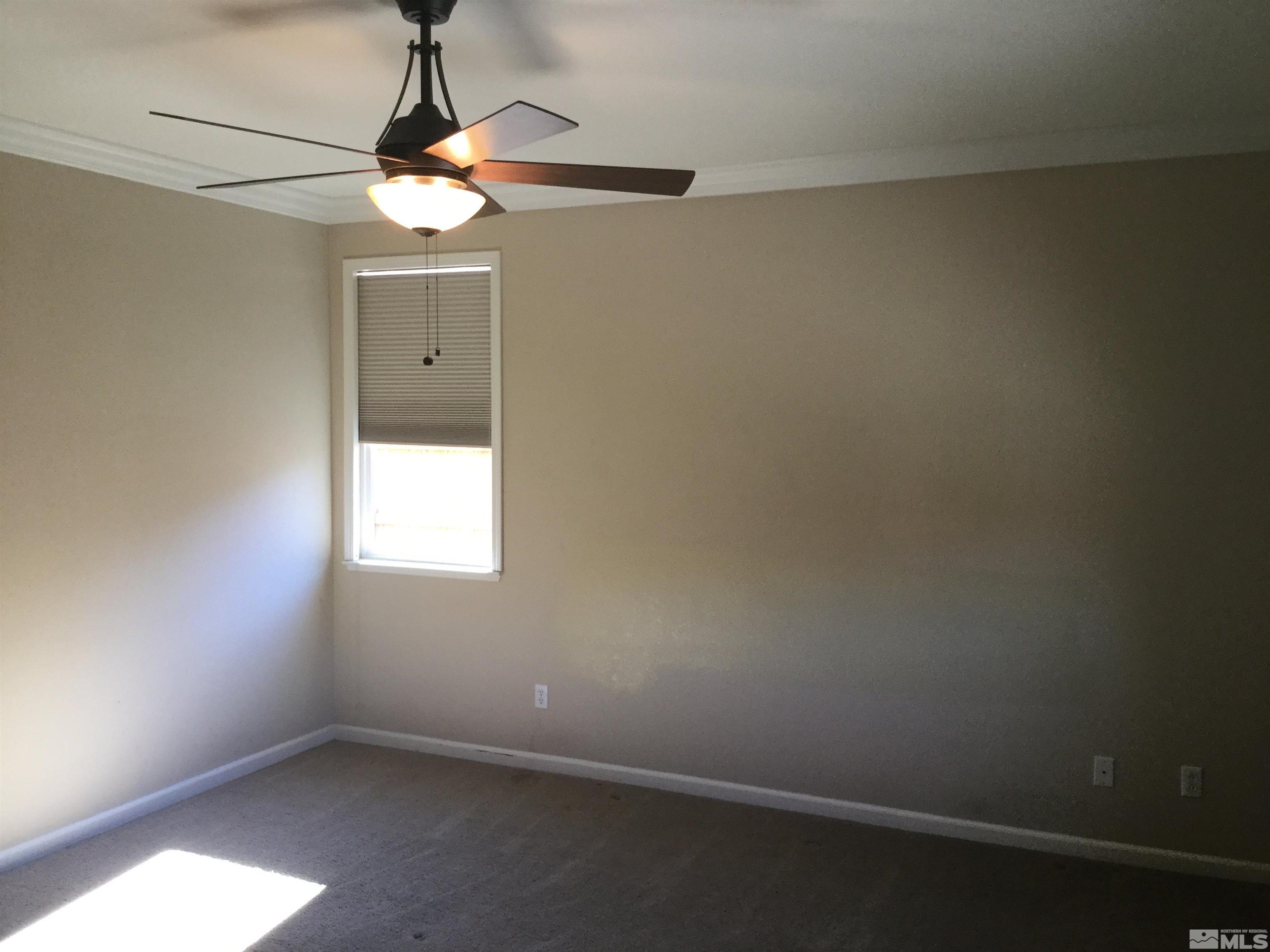 8945 Convair Way Reno, NV 89506 - Photo 17 of 26 an empty room with a window
