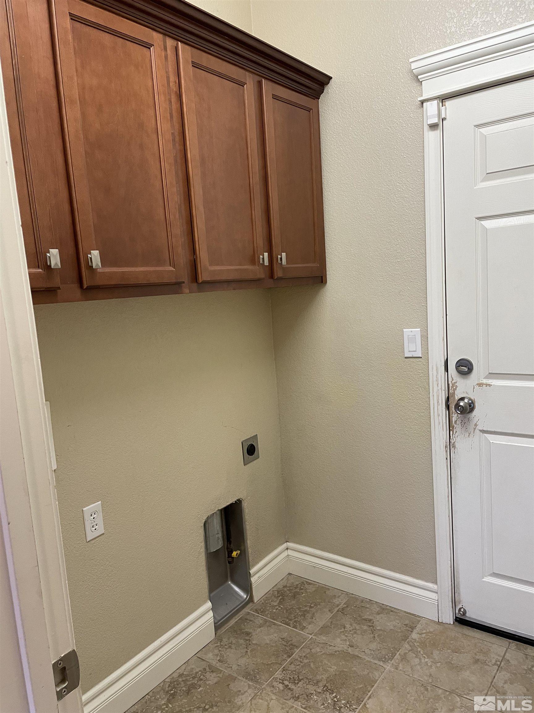 8945 Convair Way Reno, NV 89506 - Photo 23 of 26 a view of a storage and utility room