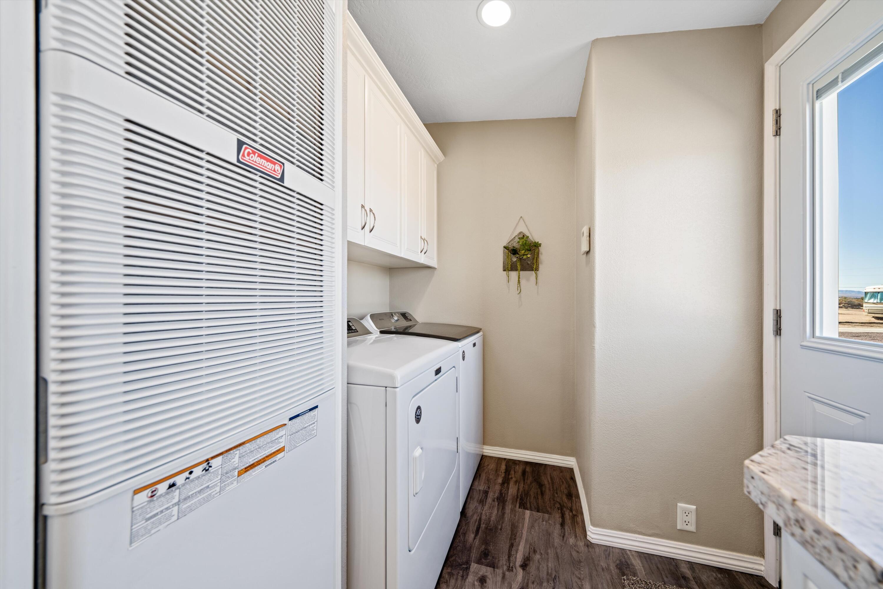 48197 Valley Center Road Newberry Springs, CA 92365 - Photo 24 of 32 a kitchen with a sink a refrigerator and window