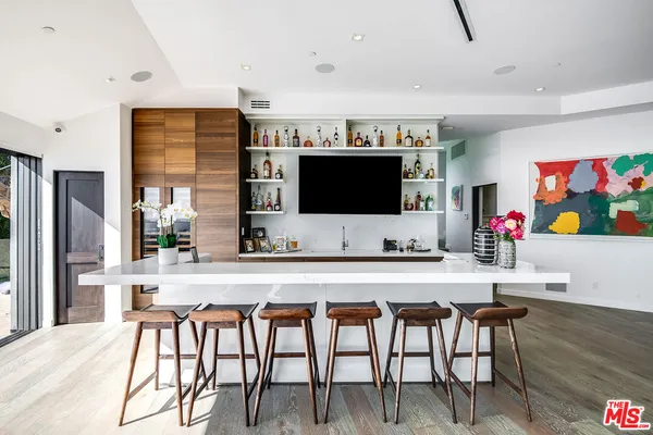 a view of a living room and dining room