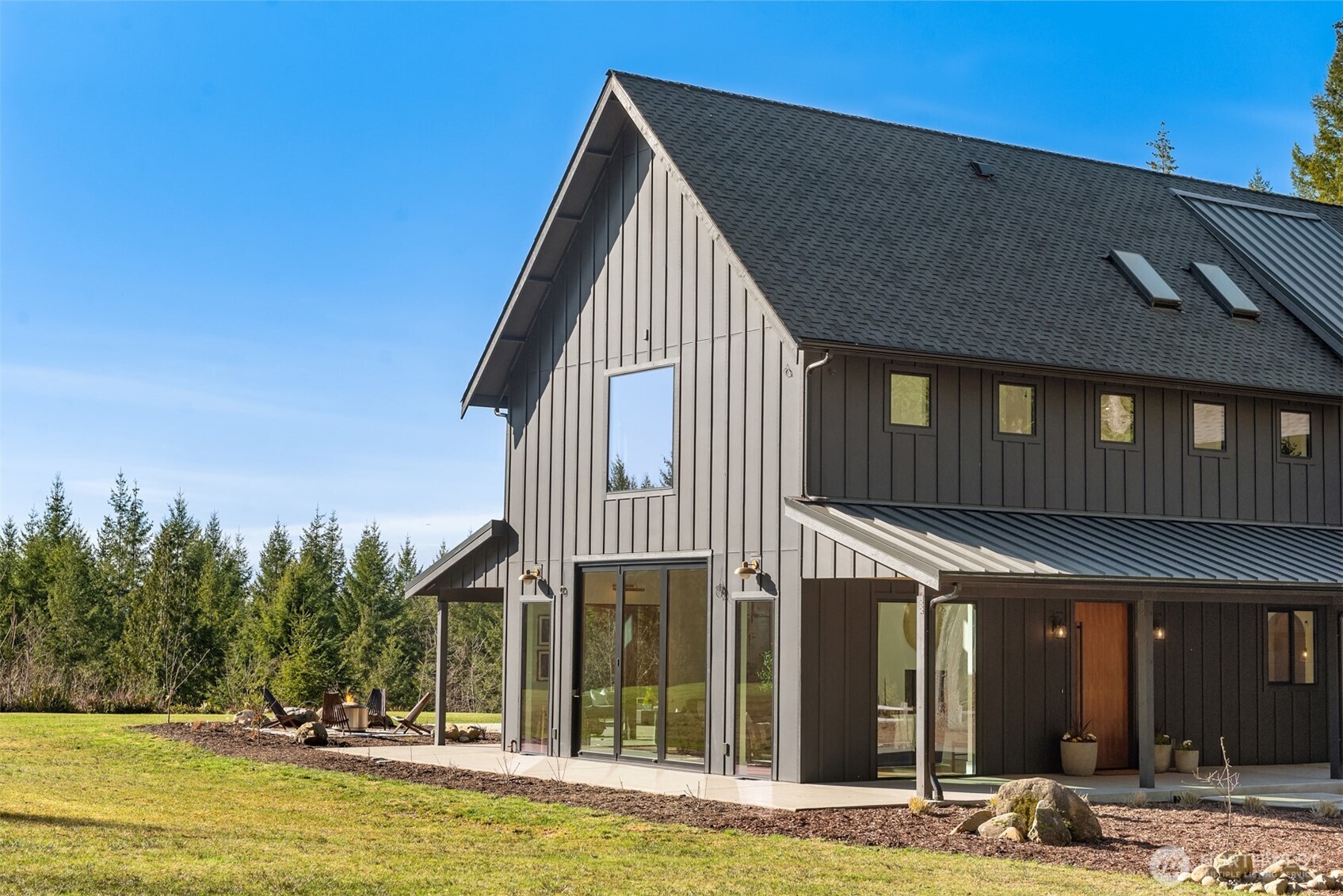 33310 Northeast 95th Place Carnation, WA 98014 - Photo 2 of 40 a view of a house with a swimming pool