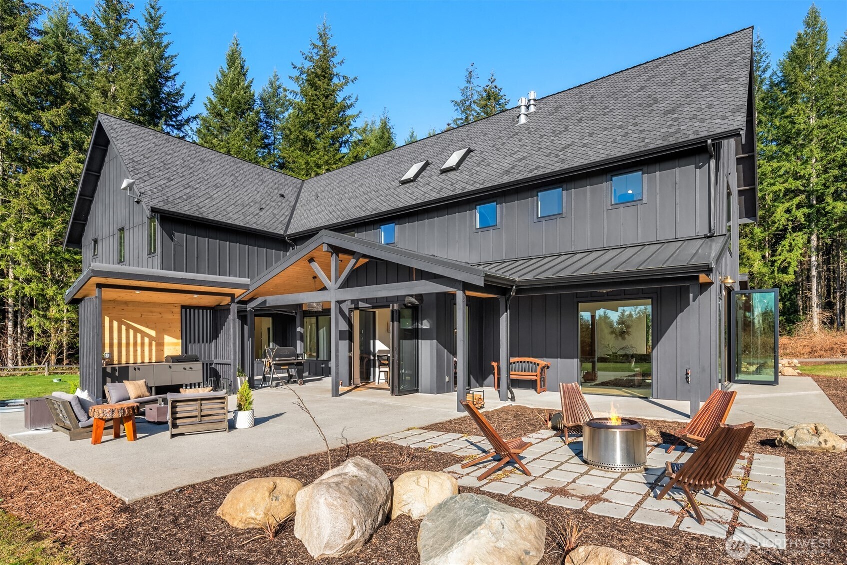 33310 Northeast 95th Place Carnation, WA 98014 - Photo 28 of 40 a view of a house with backyard porch and patio