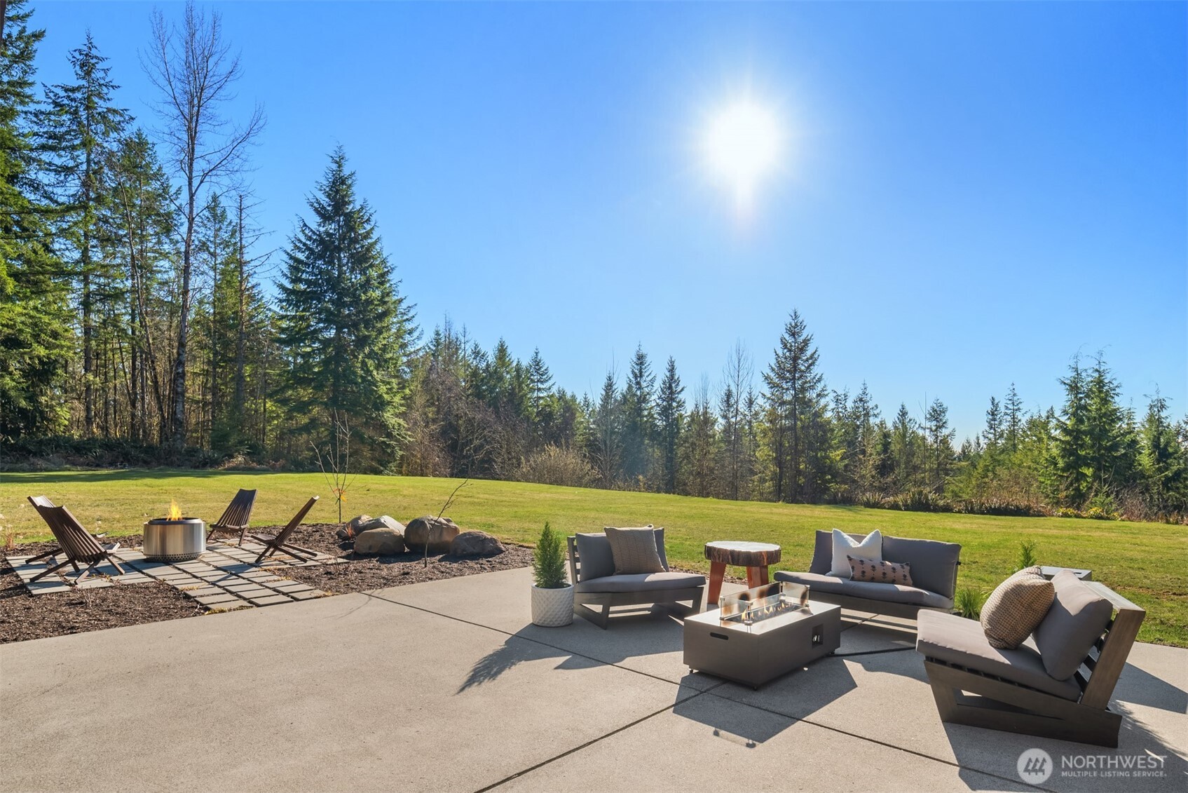 33310 Northeast 95th Place Carnation, WA 98014 - Photo 30 of 40 a view of a lake with couches and city view