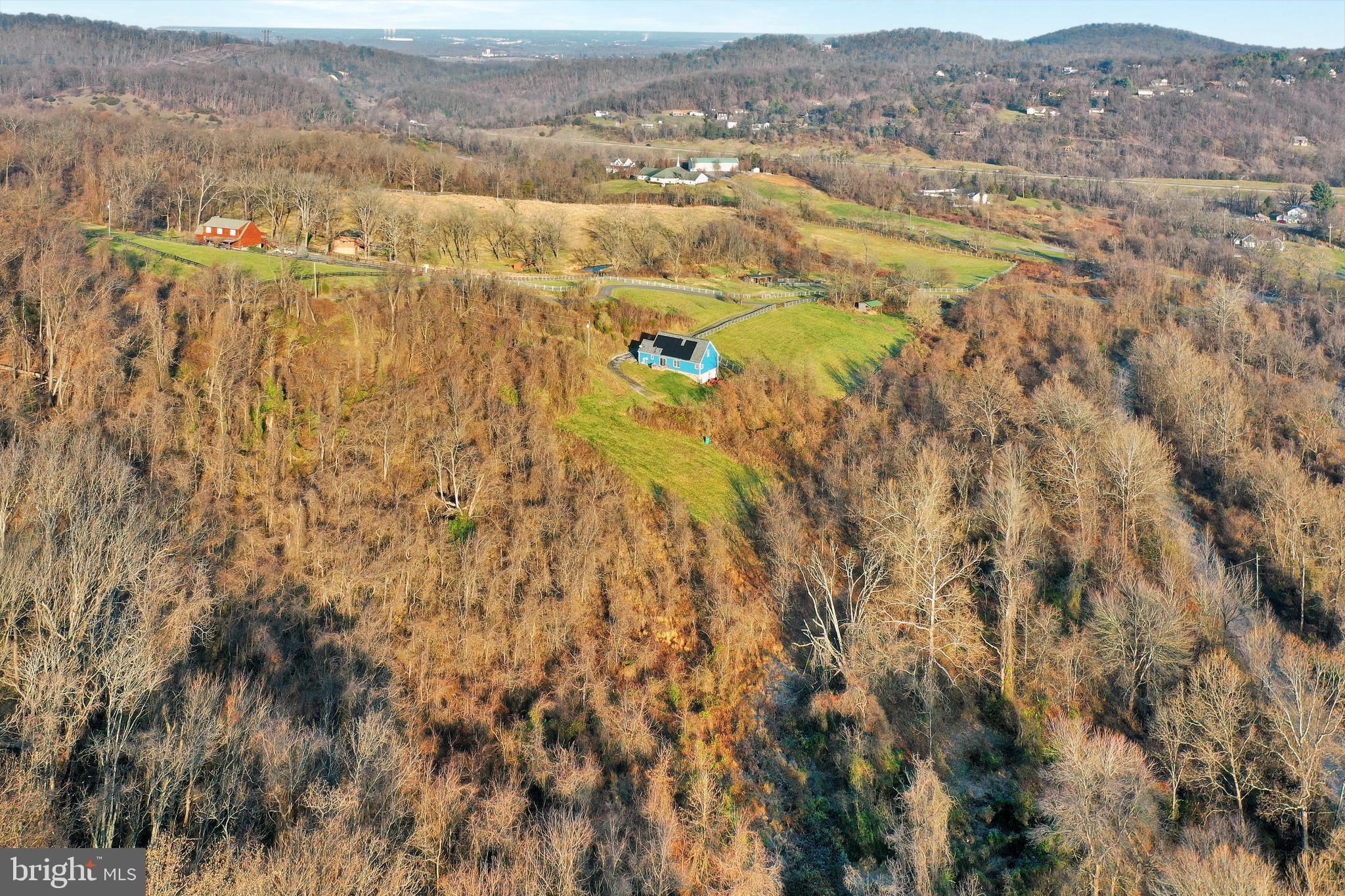 0 Wapping Farm Road, Unit LOT 7 Front Royal, VA 22630 - Photo 33 of 41 an aerial view of residential houses with outdoor space and trees