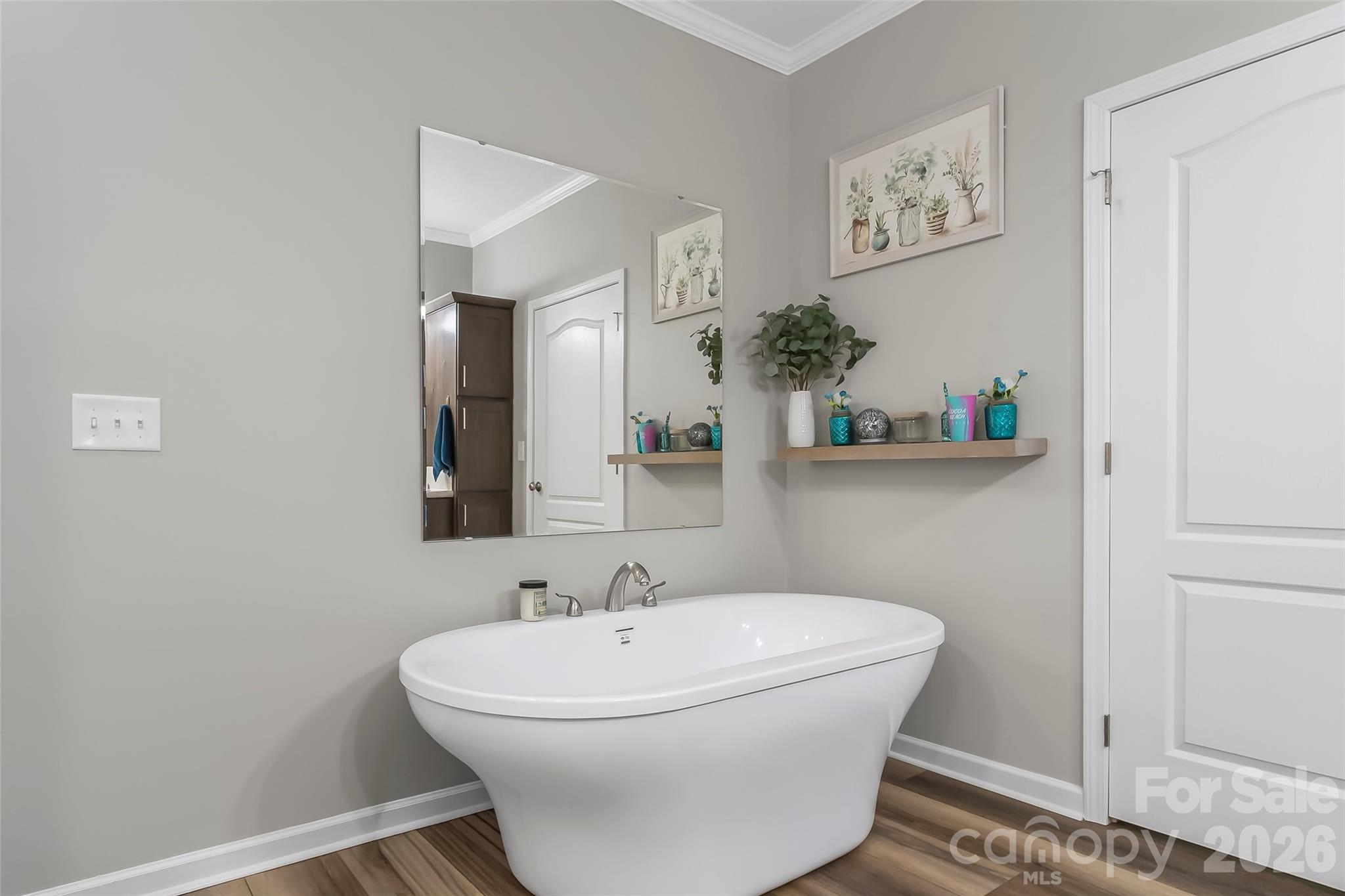 3511 Randleman Road Iron Station, NC 28080 - Photo 18 of 31 a bathroom with a sink and mirror with toilet