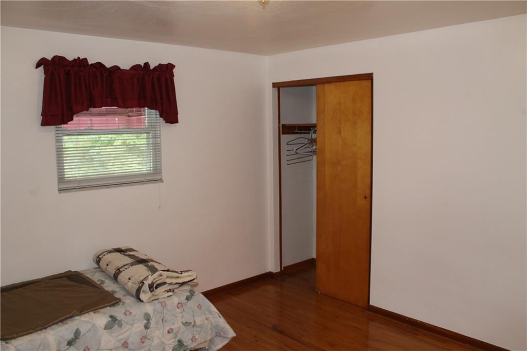 11 6th Way Russellton, PA 15076 - Photo 14 of 20 a view of a bedroom with wooden floor and a window