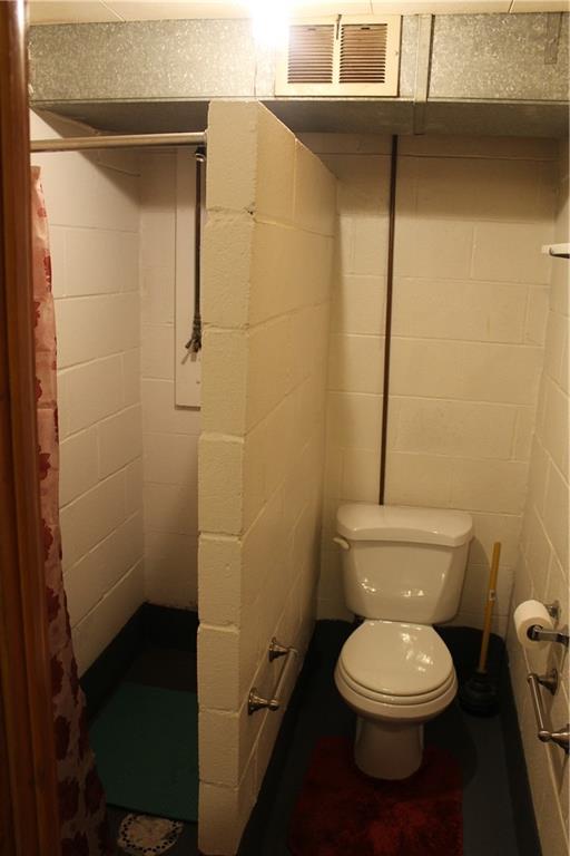 11 6th Way Russellton, PA 15076 - Photo 18 of 20 a white toilet sitting next to a bathroom sink