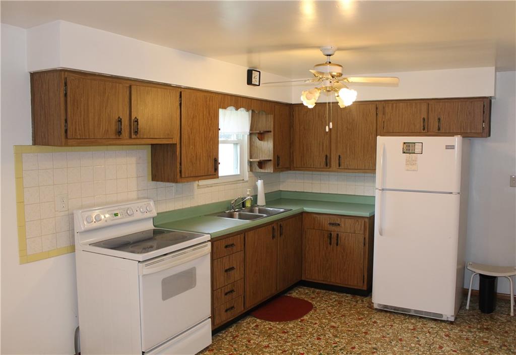 11 6th Way Russellton, PA 15076 - Photo 7 of 20 a kitchen with a sink a stove a refrigerator and cabinets