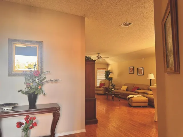 a view of a living room and dining room