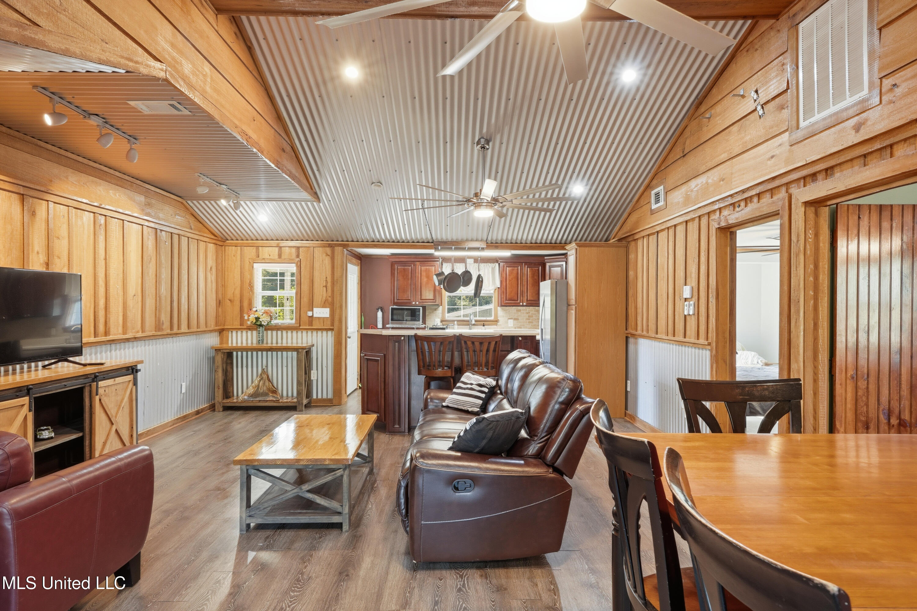 54 Oak Point Road Picayune, MS 39466 - Photo 11 of 27 LIVING AND KITCHEN