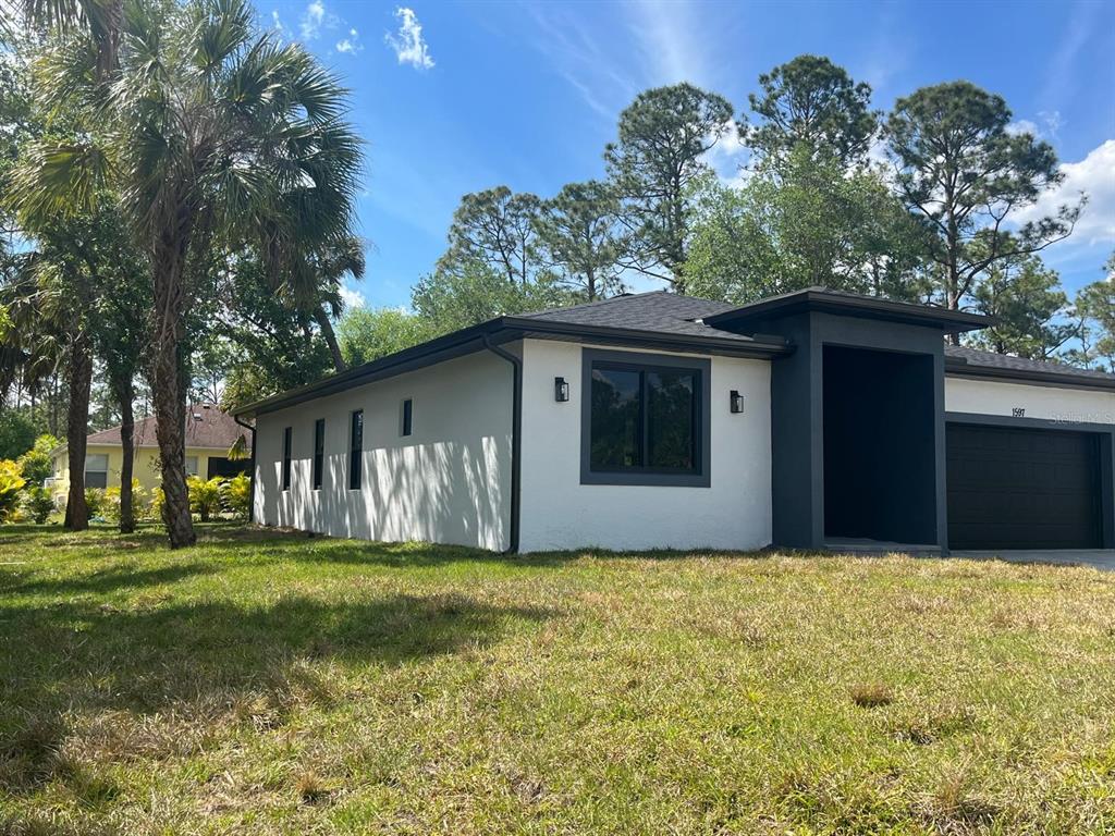 1597 Kerman Street North Port, FL 34288 - Photo 3 of 42