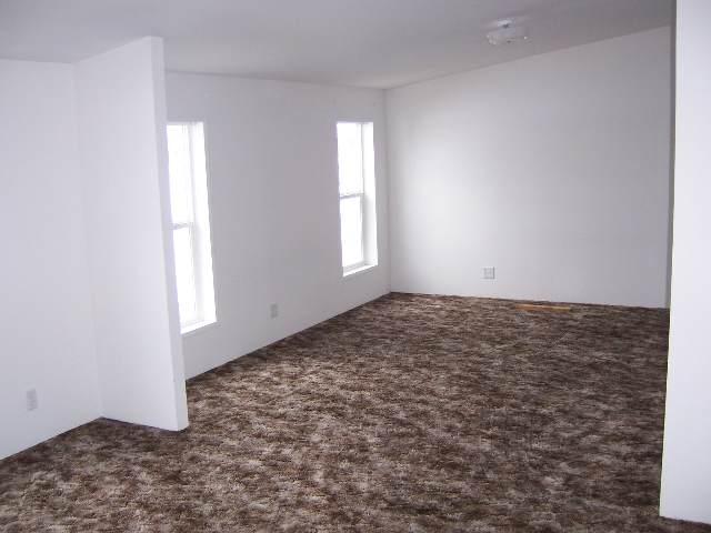 423 Wilcox Road Tieton, WA 98947 - Photo 2 of 4 an empty room with windows