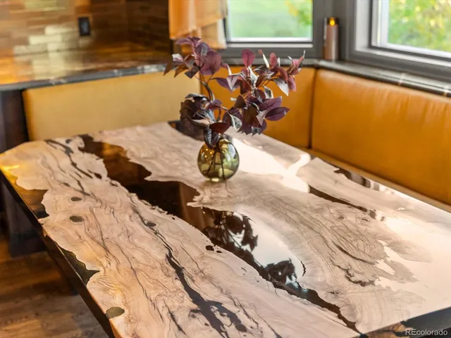 a view of a living room and dining room