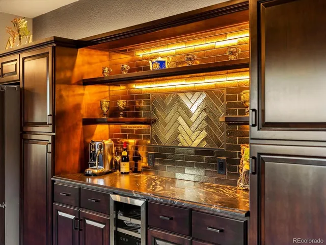 a living room with furniture and flowers