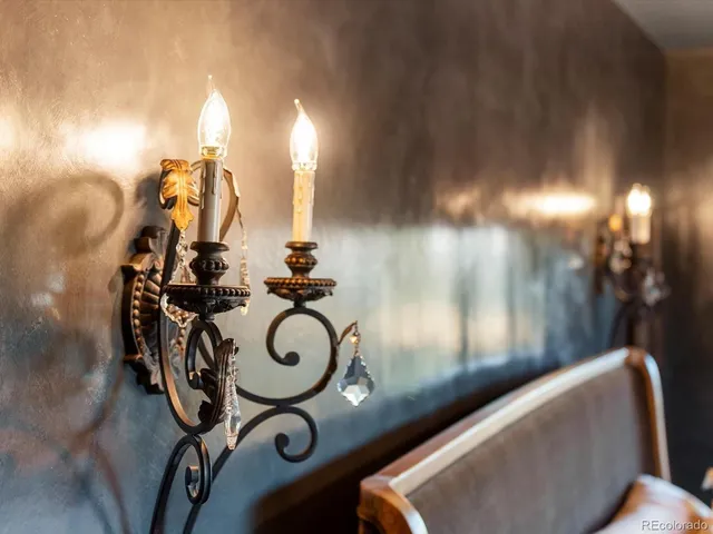 a bedroom with a bed and a fireplace