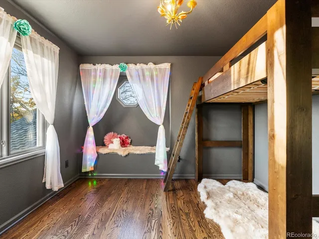 a view of a livingroom with furniture and a chandelier