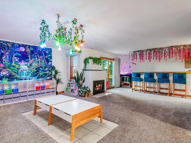 a bedroom with furniture and a fireplace