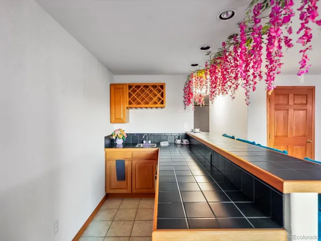 a view of a golf course with a lake view