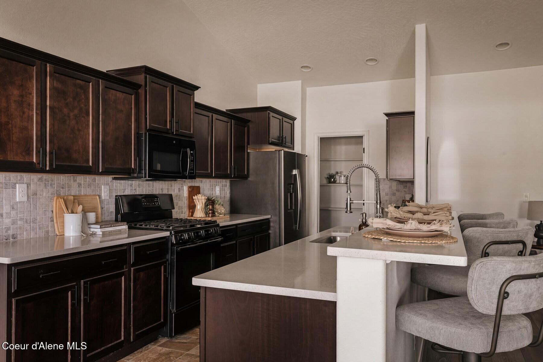 778 West Jenicek Loop Post Falls, ID 83854 - Photo 17 of 30 Kitchen and Pantry