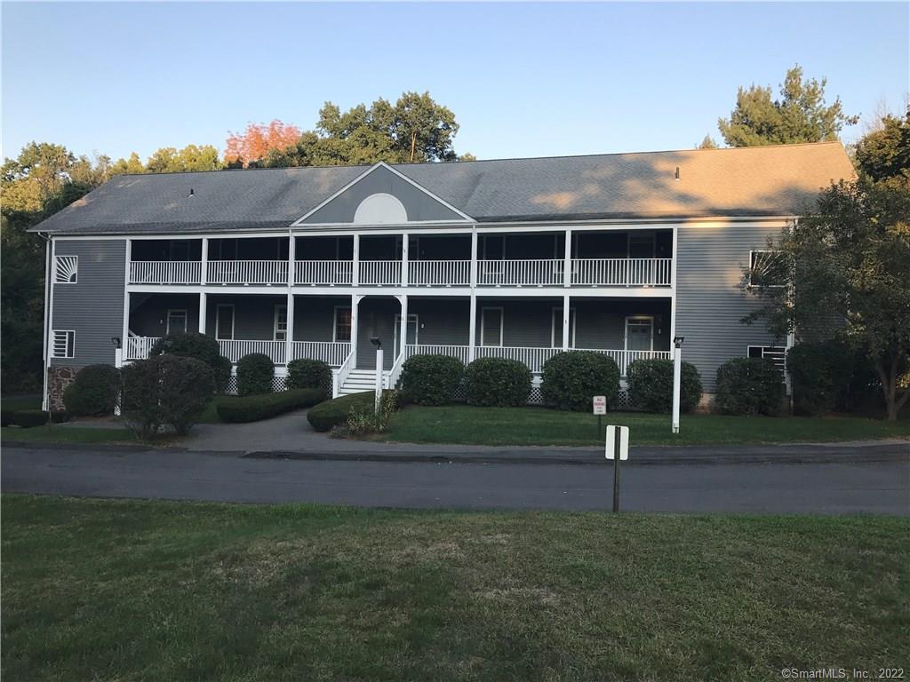 22 Main St Extension, Unit B6 Simsbury, CT 06081 - Photo 1 of 1 a front view of a house with a yard