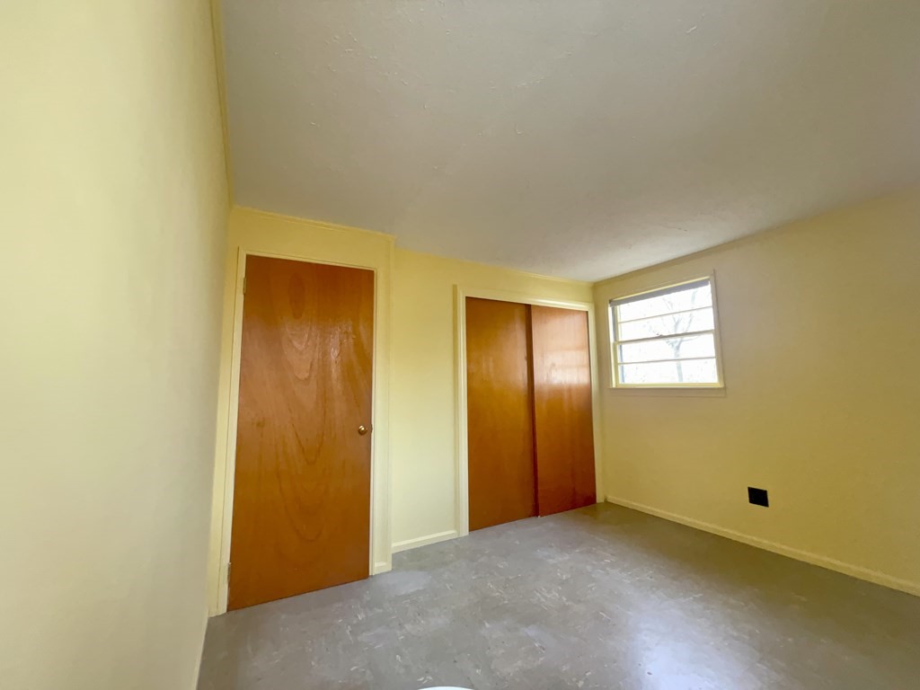 31 Bear Hill Road Stoneham, MA 02180 - Photo 14 of 30 a view of an empty room and window