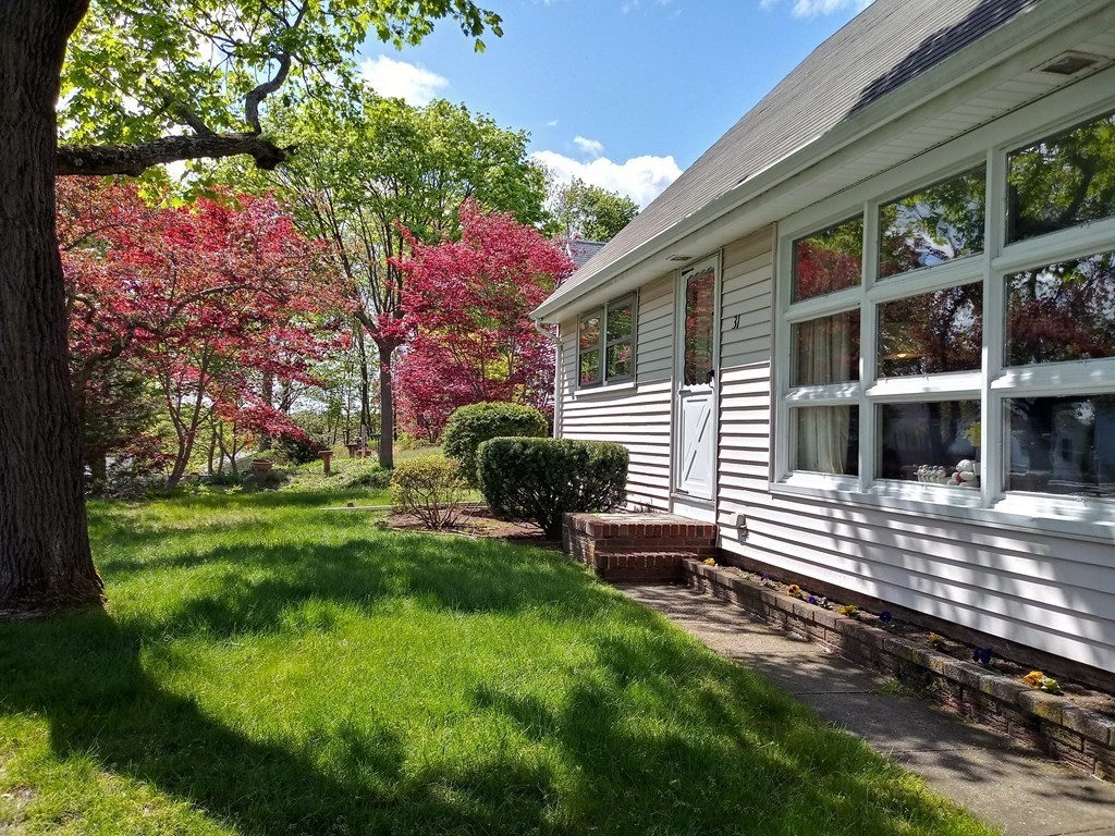 31 Bear Hill Road Stoneham, MA 02180 - Photo 2 of 30 a house view with a garden space