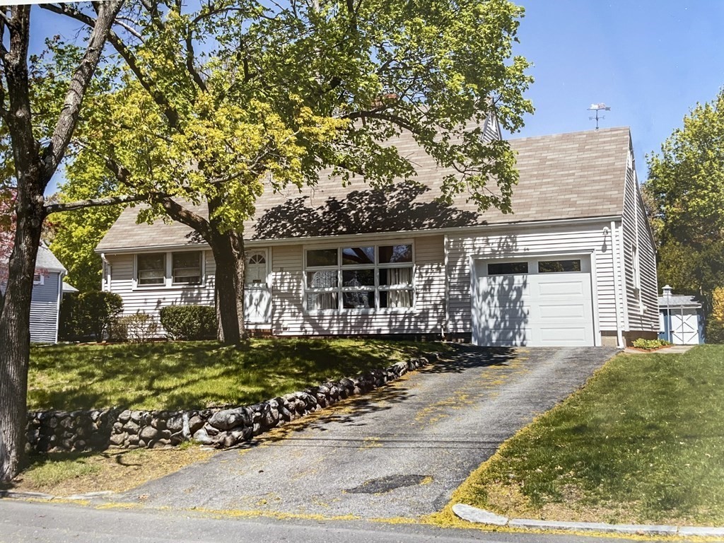 31 Bear Hill Road Stoneham, MA 02180 - Photo 27 of 30 front view of a house with a garden