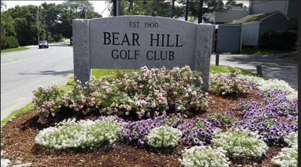 31 Bear Hill Road Stoneham, MA 02180 - Photo 29 of 30 a sign that is in front of flowers