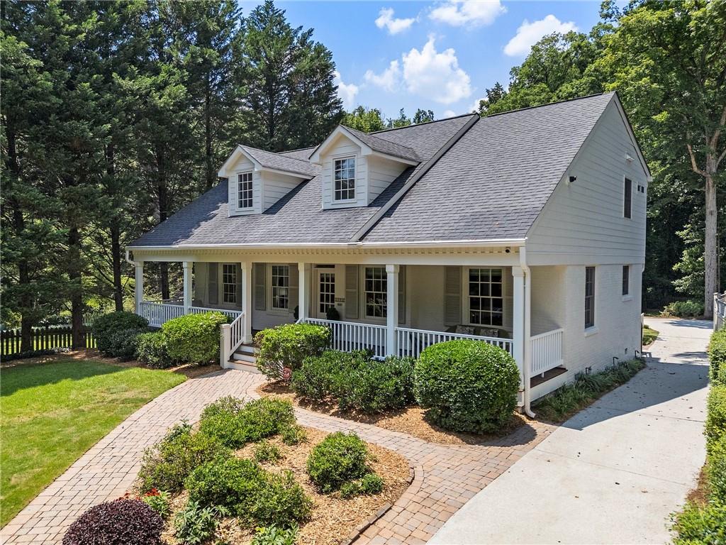 1772 Ridgewood Drive Northeast Atlanta, GA 30307 - Photo 1 of 1 a front view of a house with a yard