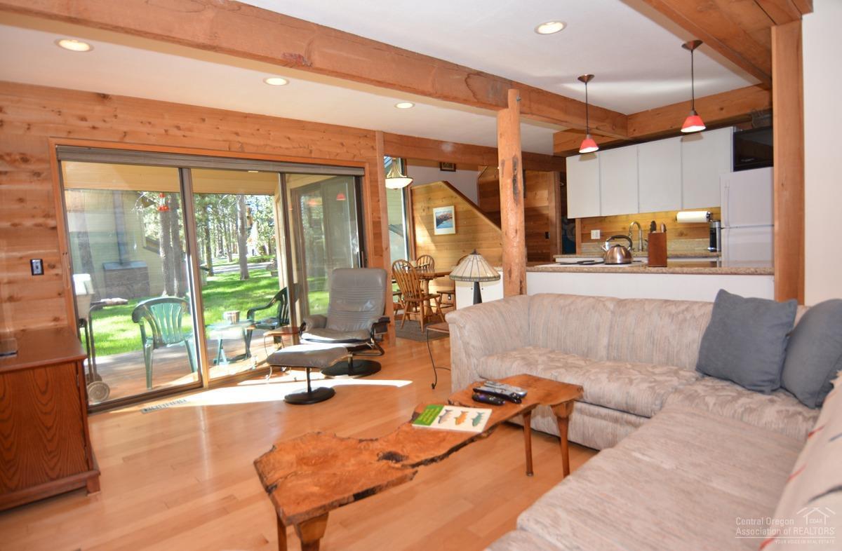 57515 Ranch Cabin Road, Unit B15 Sunriver, OR 97707 - Photo 10 of 21 Open, airy main level. Sofa opens to a d