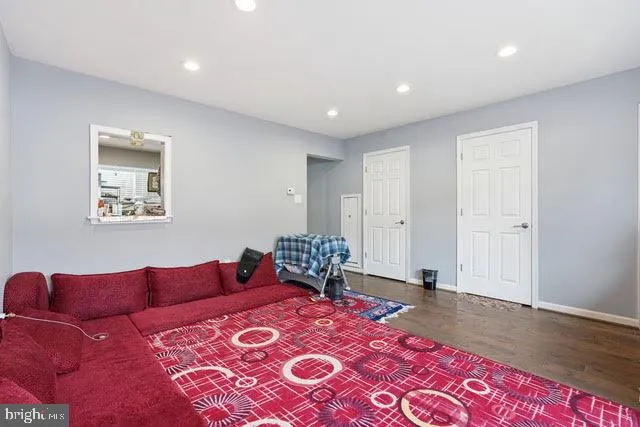 a bed room with a bed and a lamp