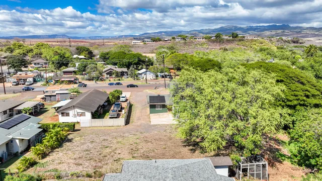 a view of a garden with an ocean