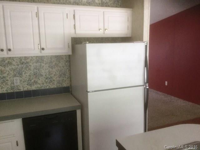 2033 Brer Rabbit Run Rock Hill, SC 29730 - Photo 4 of 13 a white refrigerator freezer sitting in a kitchen