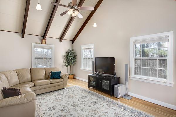 70 Longfellow Road Wellesley, MA 02481 - Photo 6 of 19 a living room with furniture and a flat screen tv