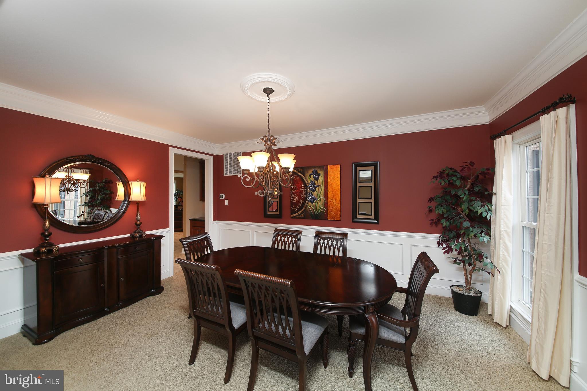 342 Alexander Drive Telford, PA 18969 - Photo 4 of 31 a dining room with furniture a chandelier and window