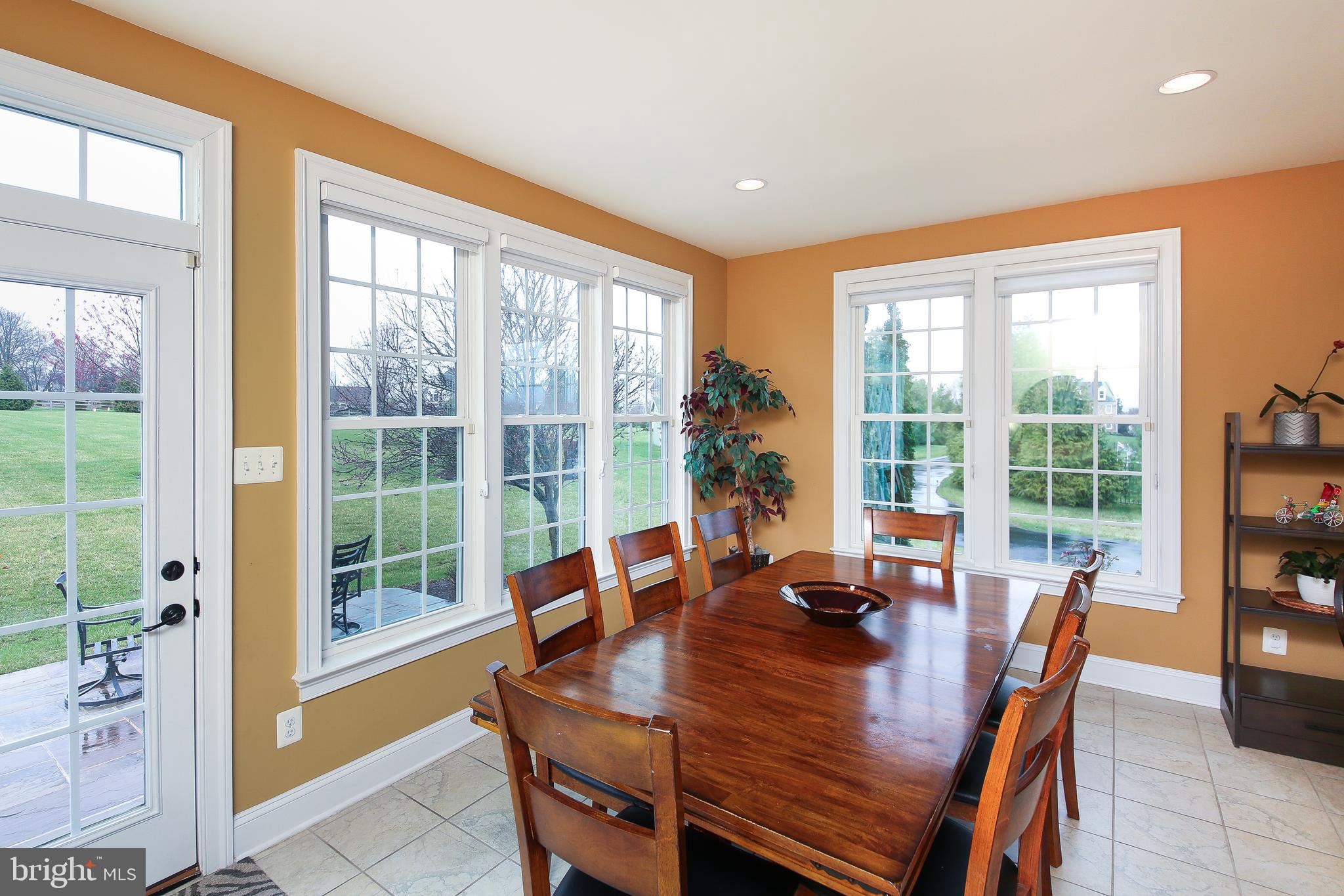342 Alexander Drive Telford, PA 18969 - Photo 8 of 31 a view of a dining room with furniture window and outside view
