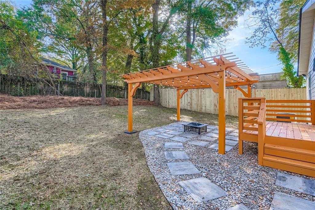 194 Dearborn Street Southeast Atlanta, GA 30317 - Photo 23 of 25 a view of a house with a backyard