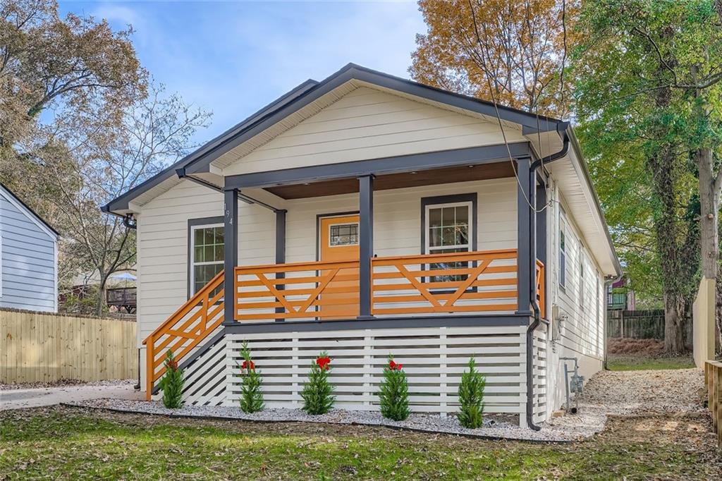 194 Dearborn Street Southeast Atlanta, GA 30317 - Photo 3 of 25 a front view of a house with garage