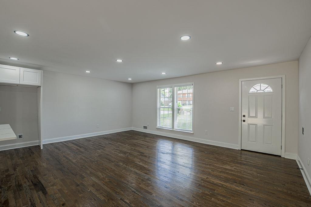 2248 Willoby Court Morrow, GA 30260 - Photo 18 of 31 an empty room with wooden floor and windows