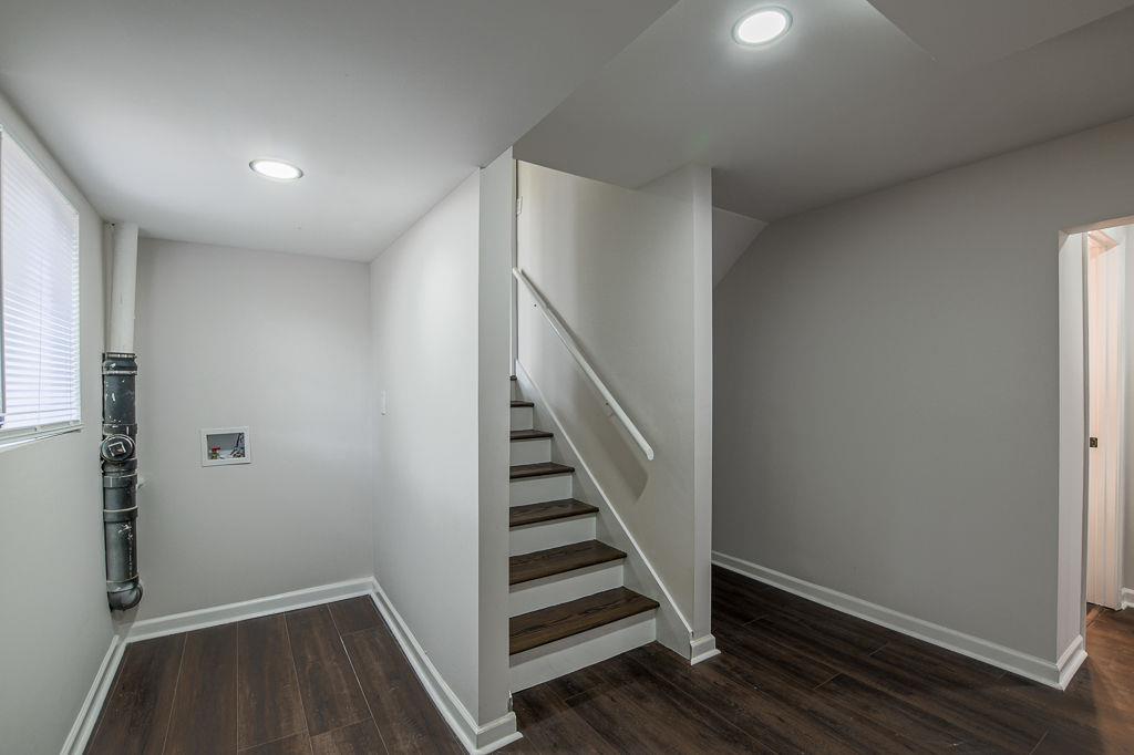 2248 Willoby Court Morrow, GA 30260 - Photo 19 of 31 a view of a hallway with entryway with wooden floor