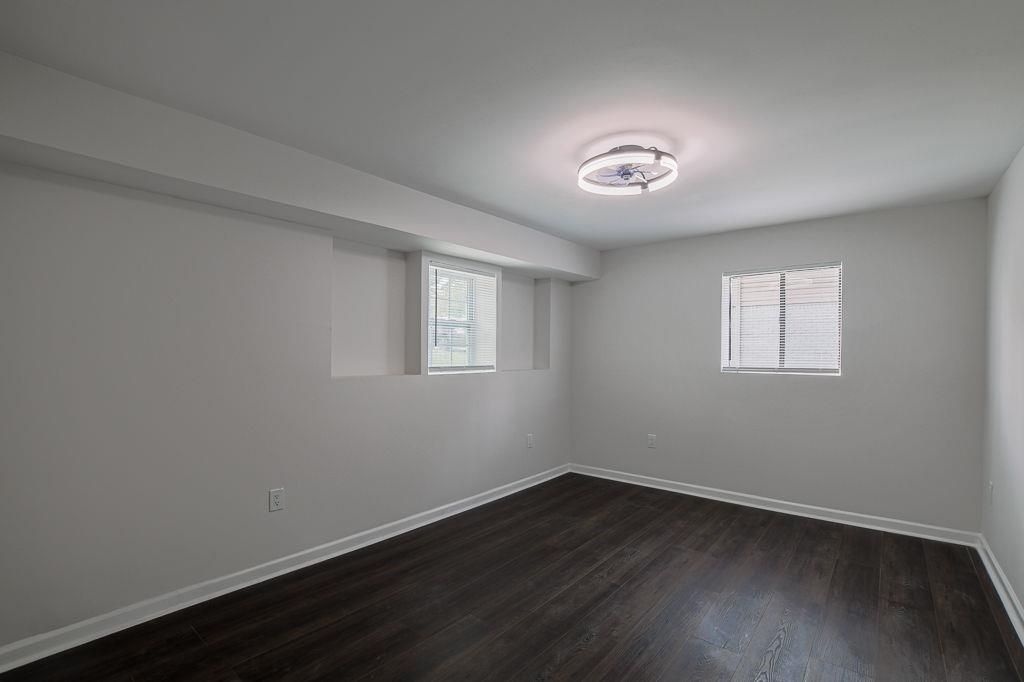 2248 Willoby Court Morrow, GA 30260 - Photo 20 of 31 a view of a room that has wooden floor and a window