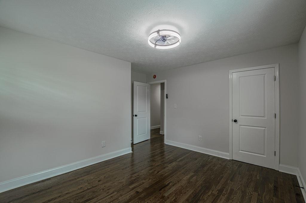 2248 Willoby Court Morrow, GA 30260 - Photo 24 of 31 a view of an empty room with wooden floor